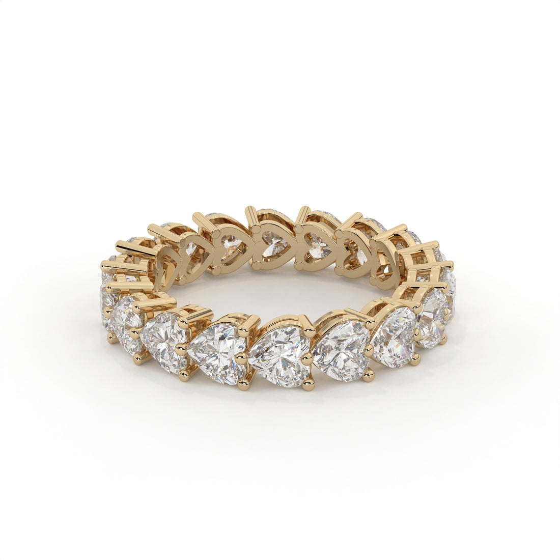 Gold ring with diamond stones on a white background
