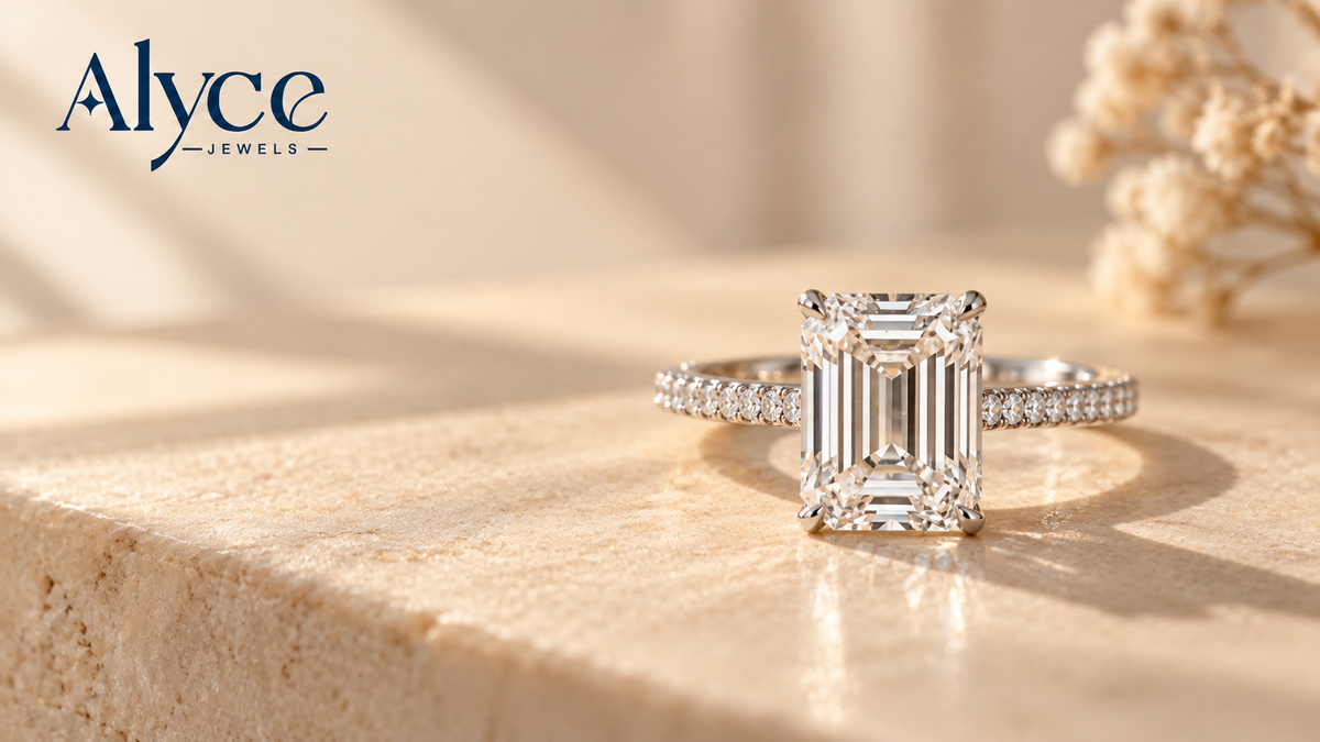Emerald cut lab-grown diamond engagement ring with long step-cut facets.