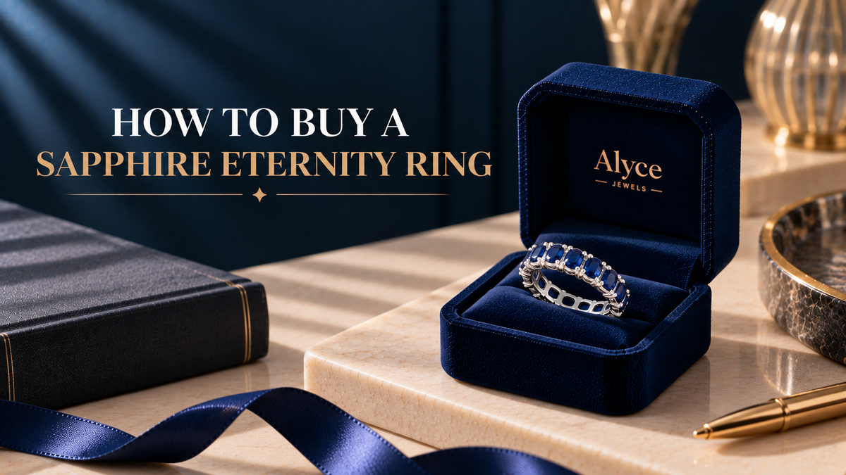 An oval blue sapphire gemstone eternity ring for a woman, crafted with 14KT white gold and placed in the ring box.