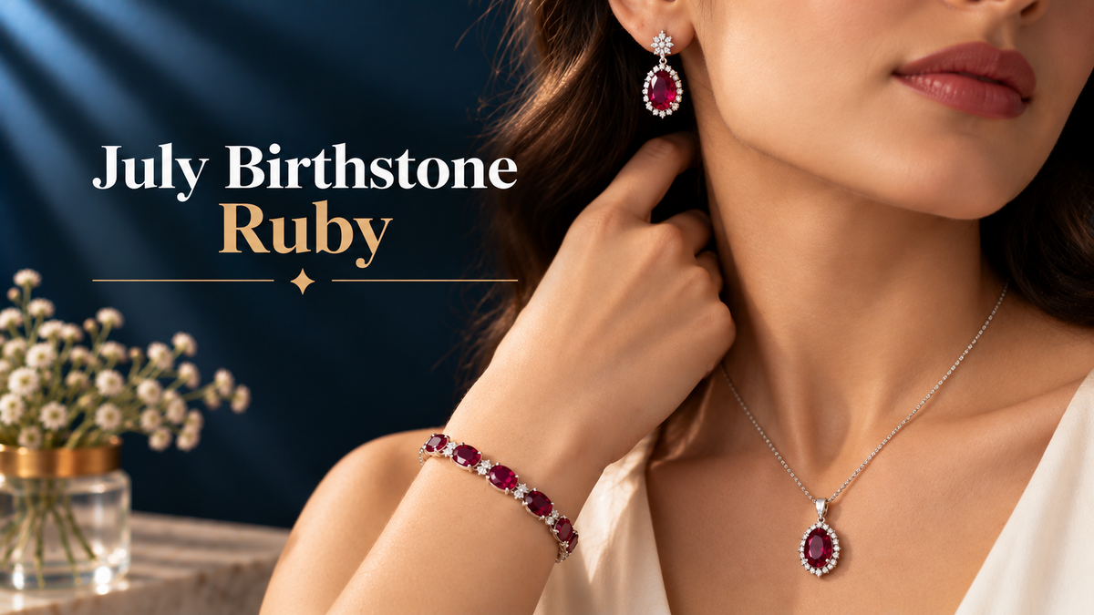 A woman wore July birthstone red ruby jewelry, including a pendant, bracelet, and earrings.
