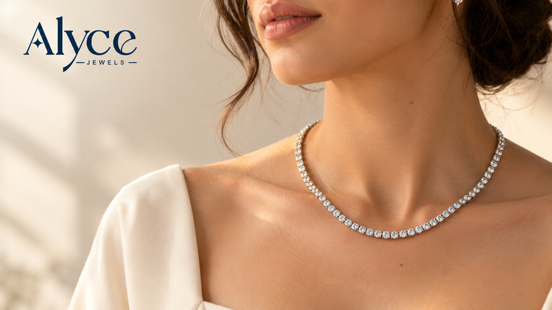 A modern woman wearing a laboratory-grown diamond tennis necklace crafted at Alyce Jewels.