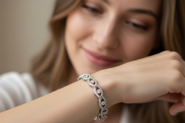 Woman wearing a diamond bracelet on her wrist.