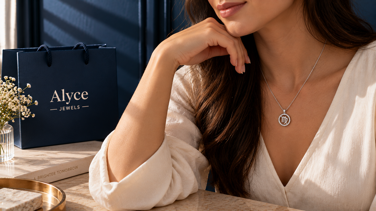 A woman wore a zodiac pendant diamond made with a 14KT yellow gold chain.