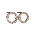 Rose gold hoop earrings with clear gemstones on a white background