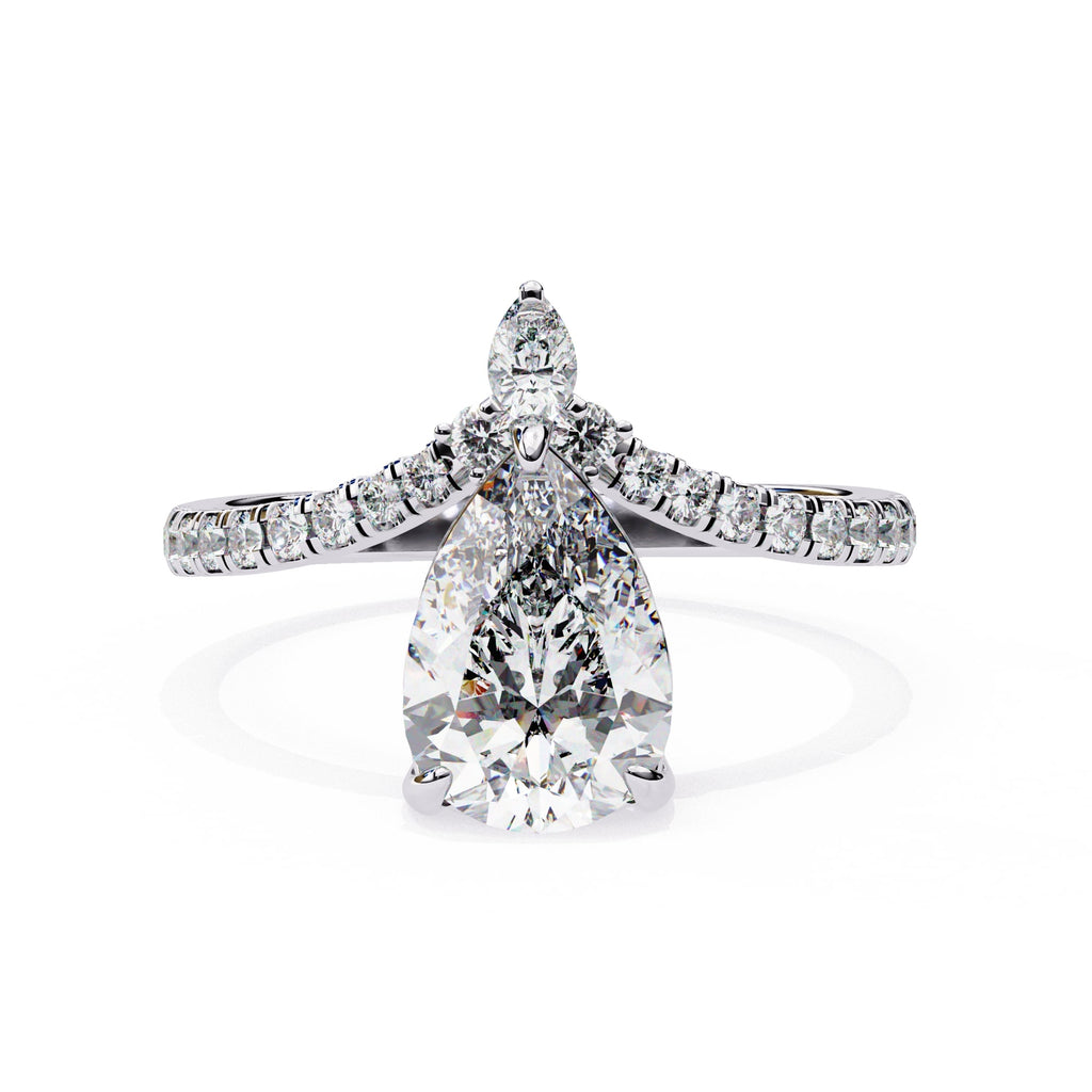Diamond ring with pear-shaped center stone on a white background