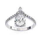 Diamond ring with a pear-shaped center stone on a white background