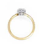 Gold and silver ring with diamond on a white background
