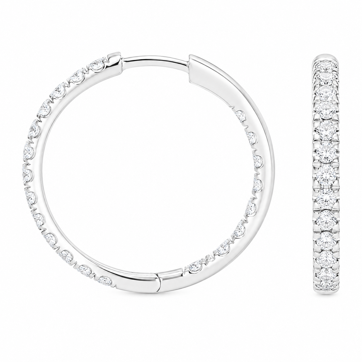 A pair of silver hoop earrings adorned with small clear stones along the outer curve, shown on a plain white background with one earring viewed from the side.