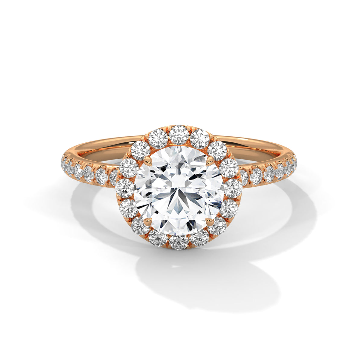 Round cut diamond halo engagement ring in rose gold with a pavé diamond band, shown in a front product view.