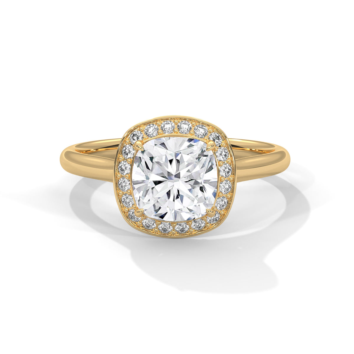 Cushion cut diamond halo engagement ring in yellow gold with a plain band, shown in a front product view.