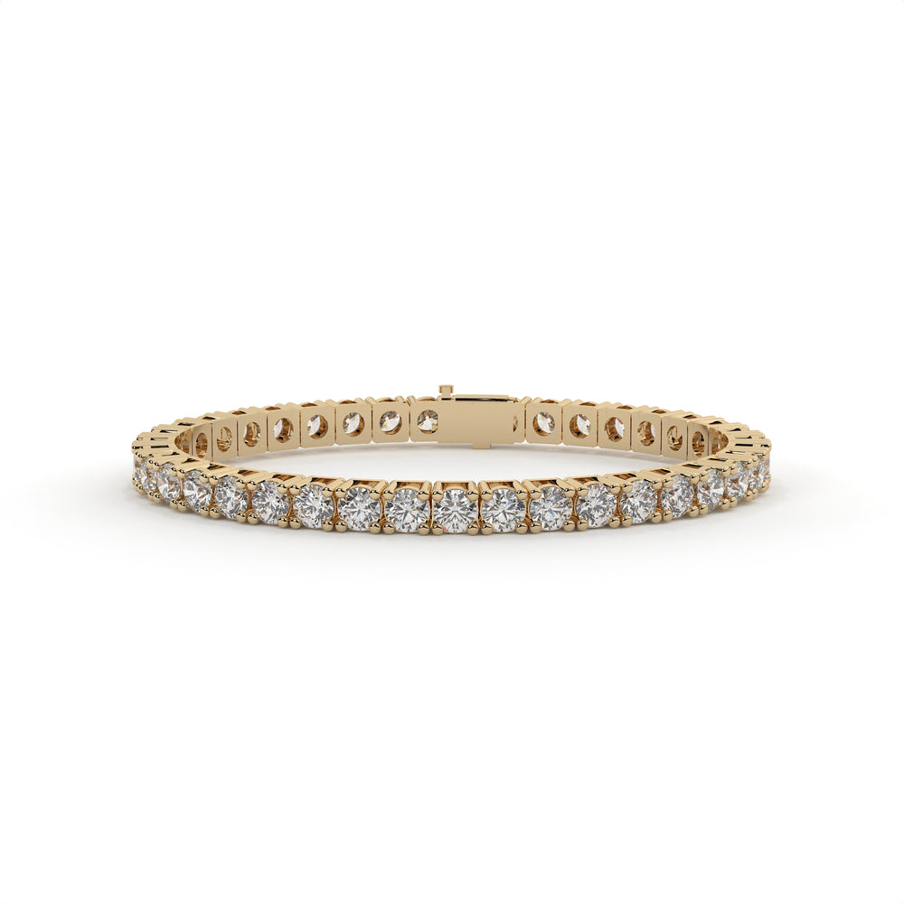 Gold bracelet with diamonds on a white background