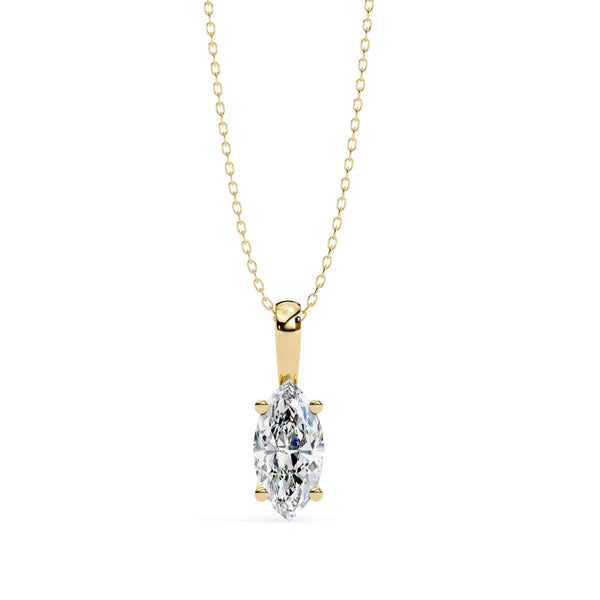 Gold necklace with a diamond pendant on a white background
