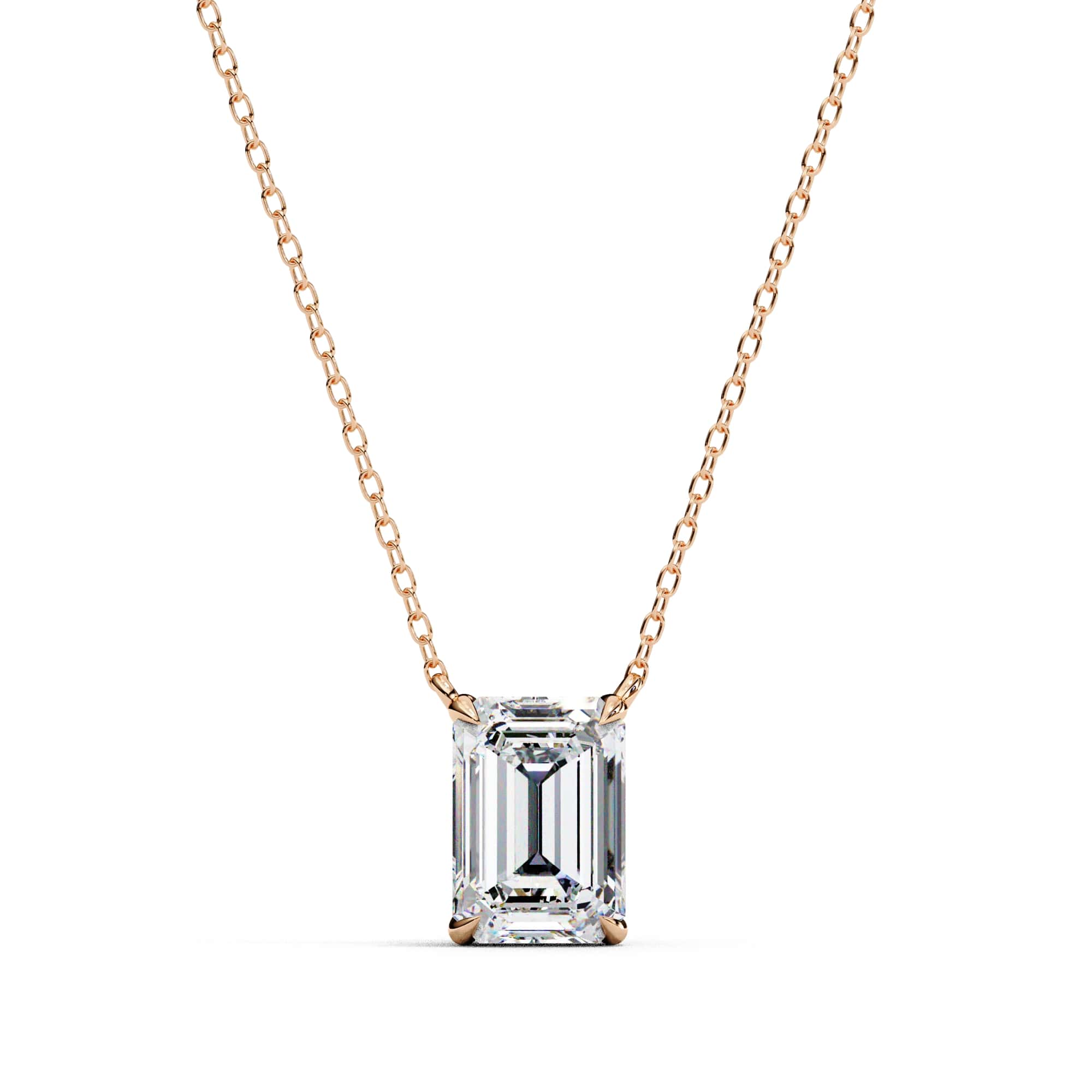 Rose gold necklace with an emerald-cut diamond pendant on a white background