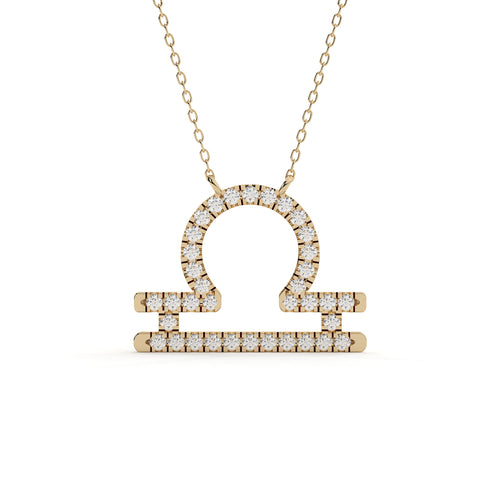 1 carat round cut lab grown diamond Libra zodiac sign pendant in yellow gold with a matching gold chain.