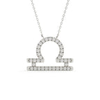 1 carat round cut lab grown diamond Libra zodiac sign pendant in yellow gold with a matching gold chain.