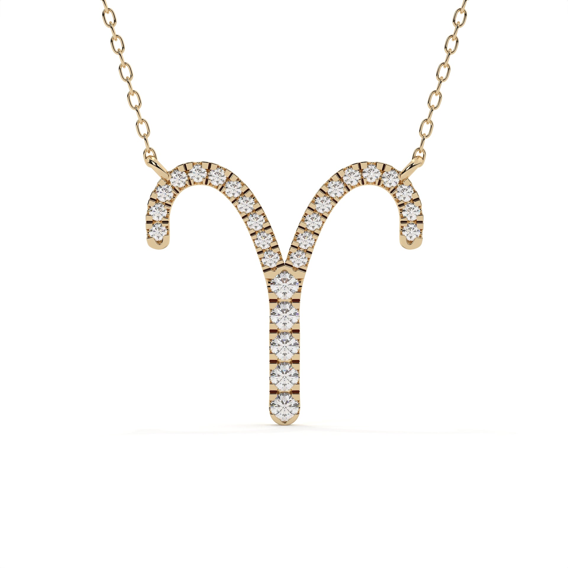 Gold necklace with zodiac sign pendant on a white background
