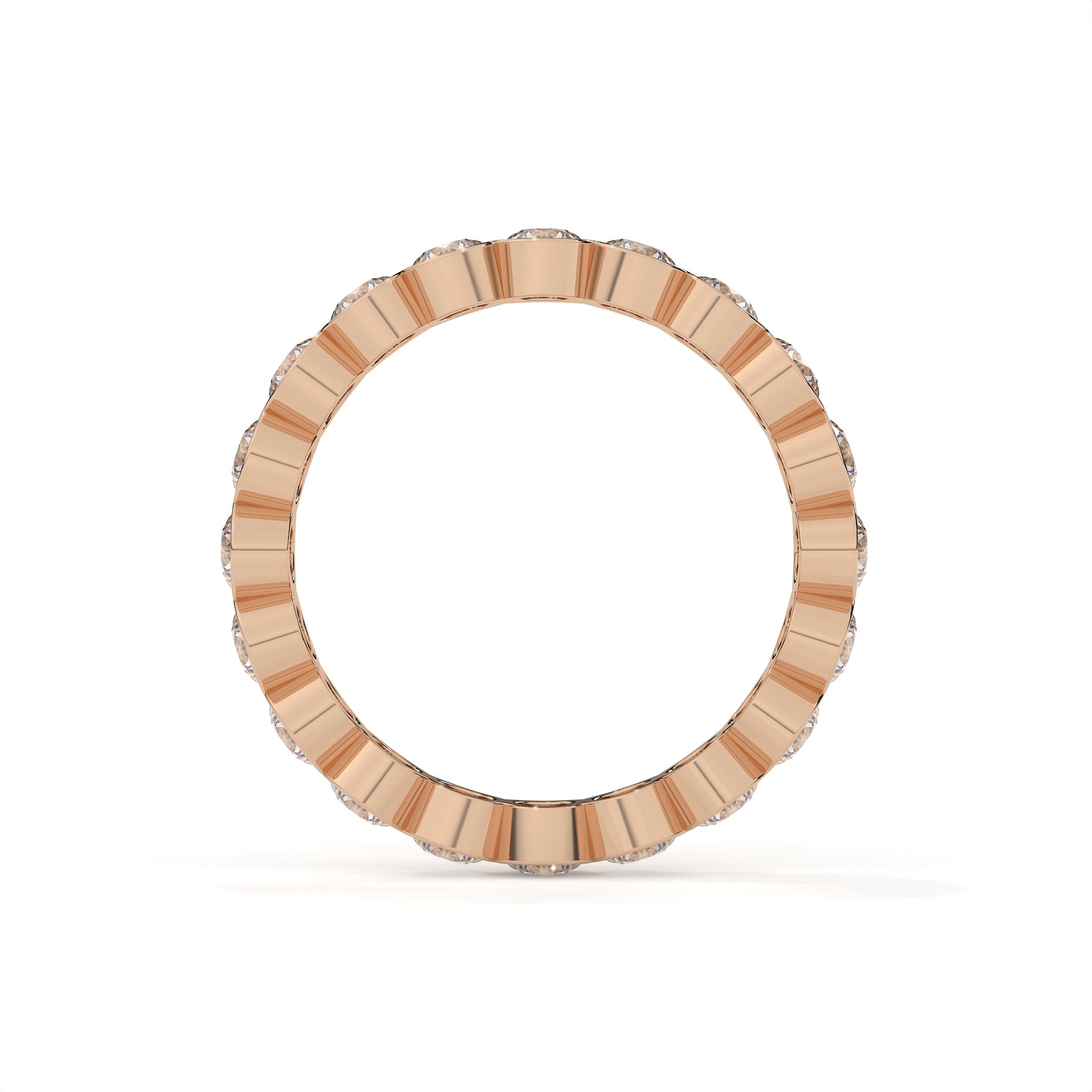 Gold ring with a textured band on a white background