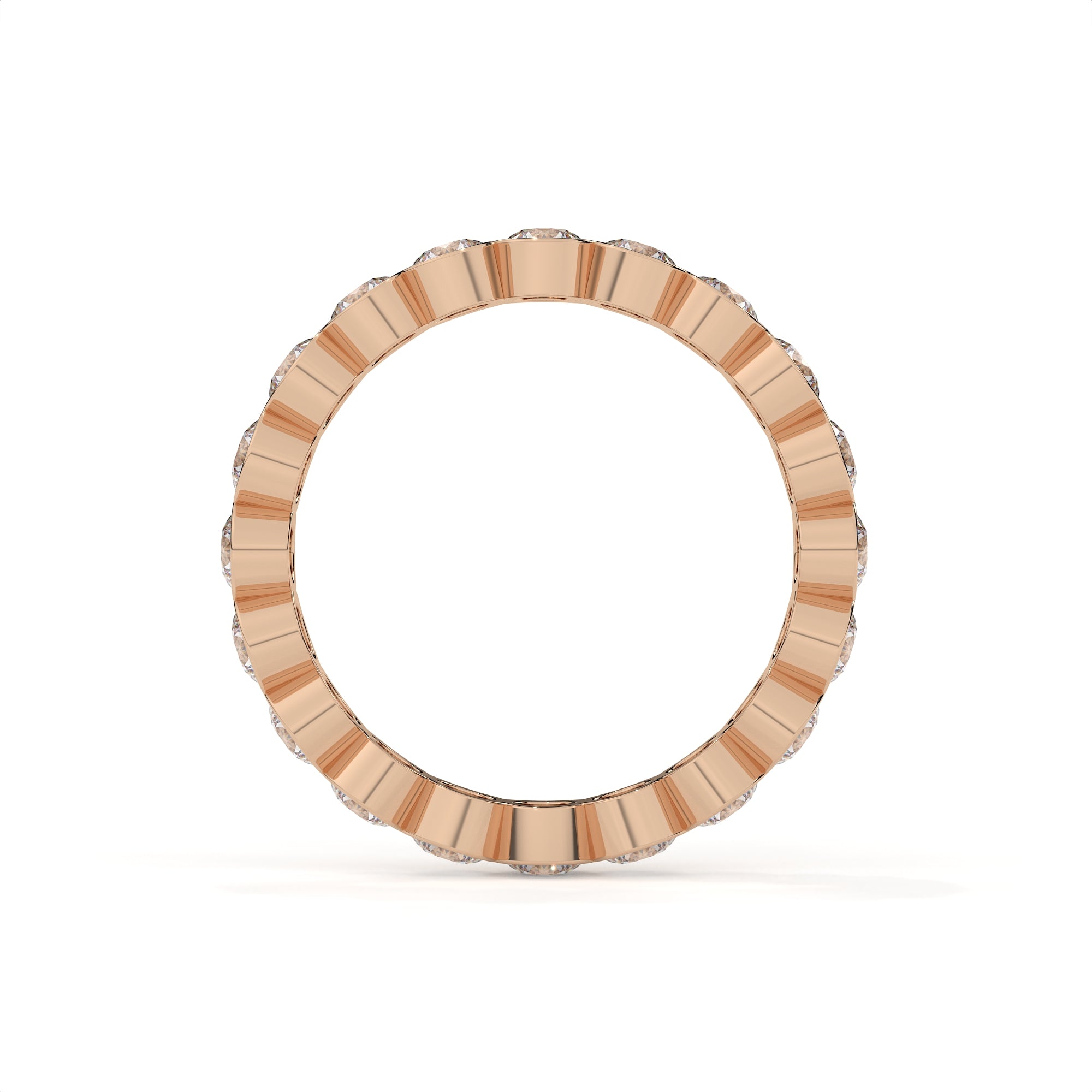 Gold ring with a textured band on a white background