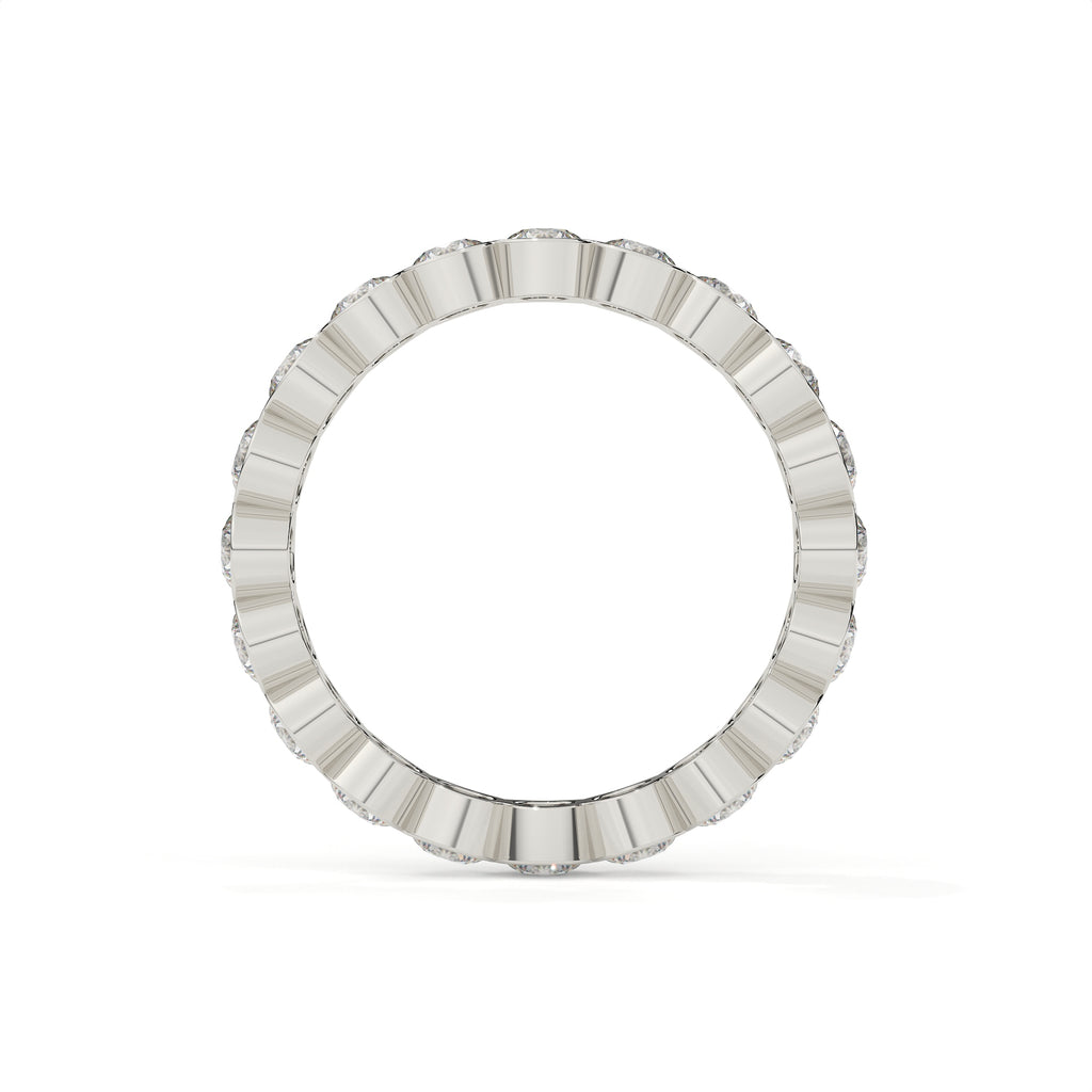 Silver ring with a textured band on a white background