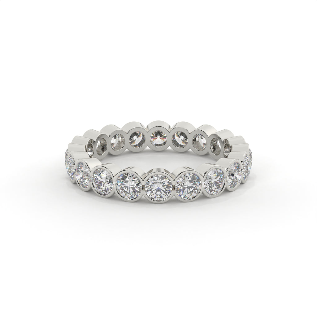 Silver ring with round diamonds on a white background