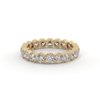 Gold ring with diamonds on a white background
