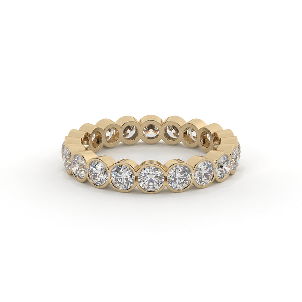 Gold ring with diamonds on a white background