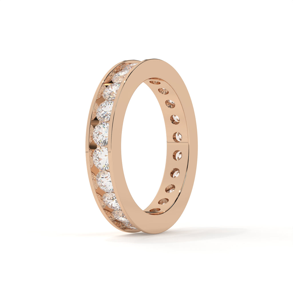Rose gold ring with diamonds on a white background