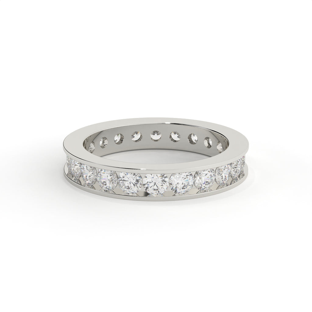 Silver ring with embedded diamonds on a white background
