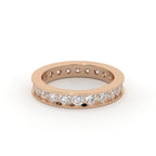 Rose gold ring with diamonds on a white background