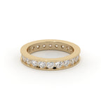 Gold ring with diamonds on a white background