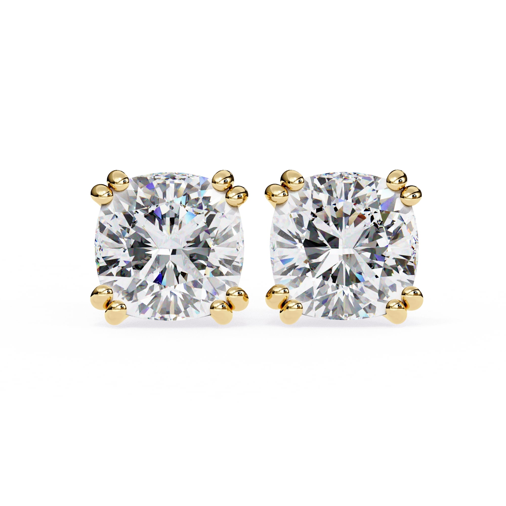 Pair of diamond stud earrings with gold prongs on a white background