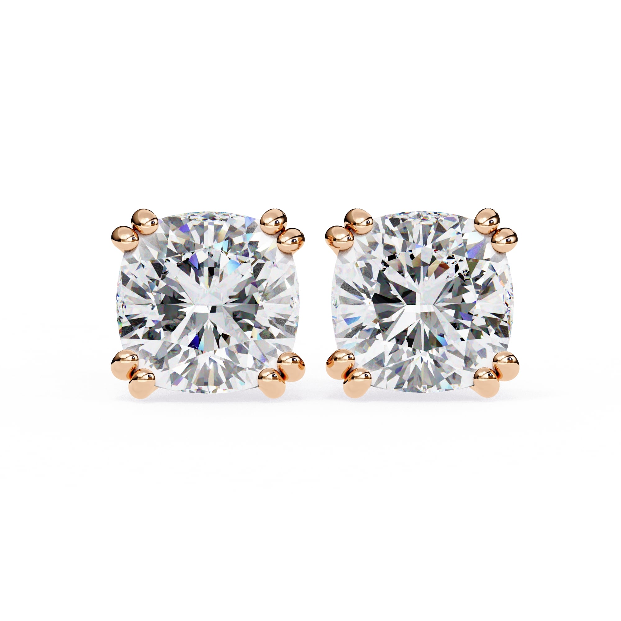 Pair of diamond stud earrings with rose gold prongs on a white background