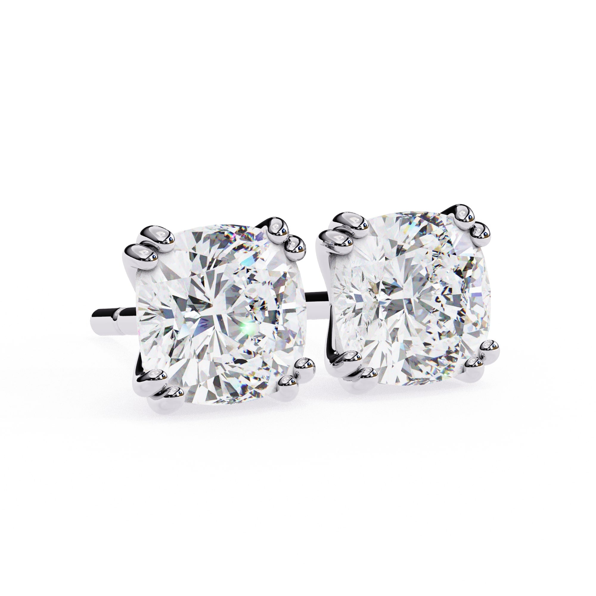 Pair of diamond stud earrings on a white background