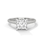 Princess cut diamond engagement ring in white gold with a pavé diamond band and four-prong setting, shown in a front product view.