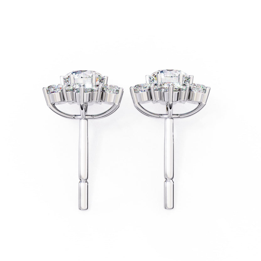 White gold round cut lab-grown diamond stud earrings for women.
