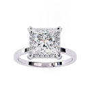 Diamond ring with a square-cut gemstone on a white background