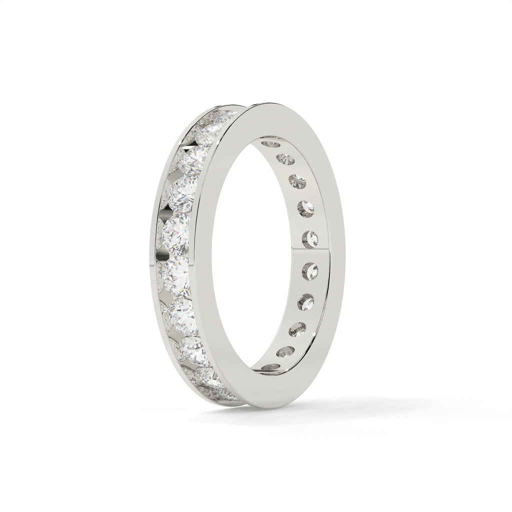 Silver ring with embedded diamonds on a white background