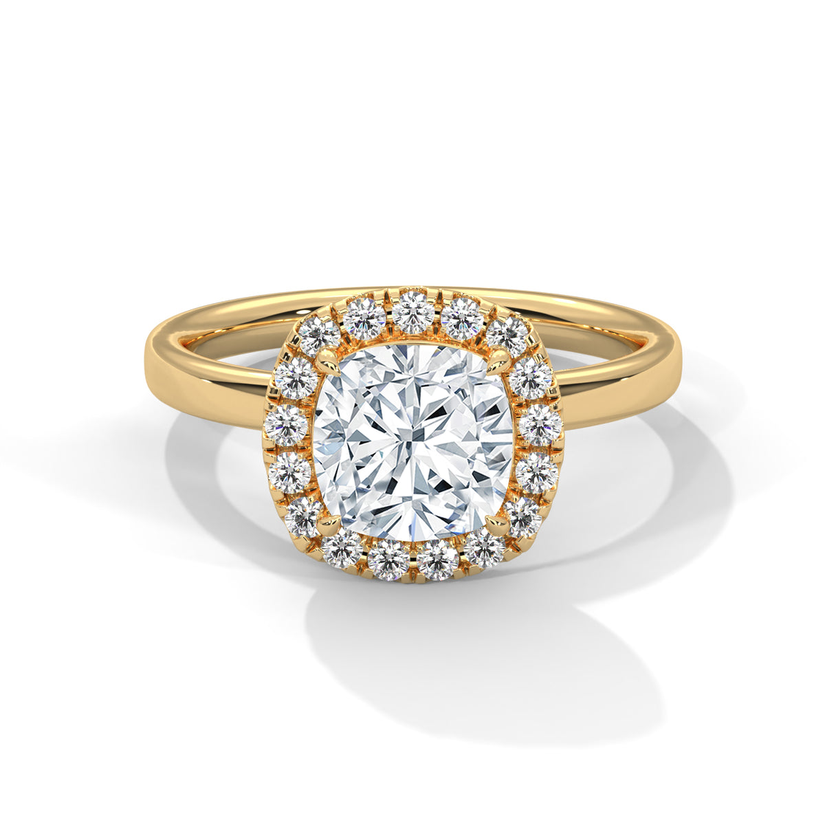 Cushion cut diamond halo engagement ring in yellow gold with a plain band, shown in a front product view.