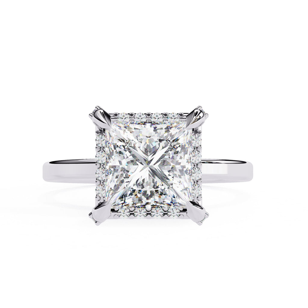 Diamond ring with a square-cut gemstone on a white background
