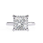 Diamond ring with a square-cut gemstone on a white background