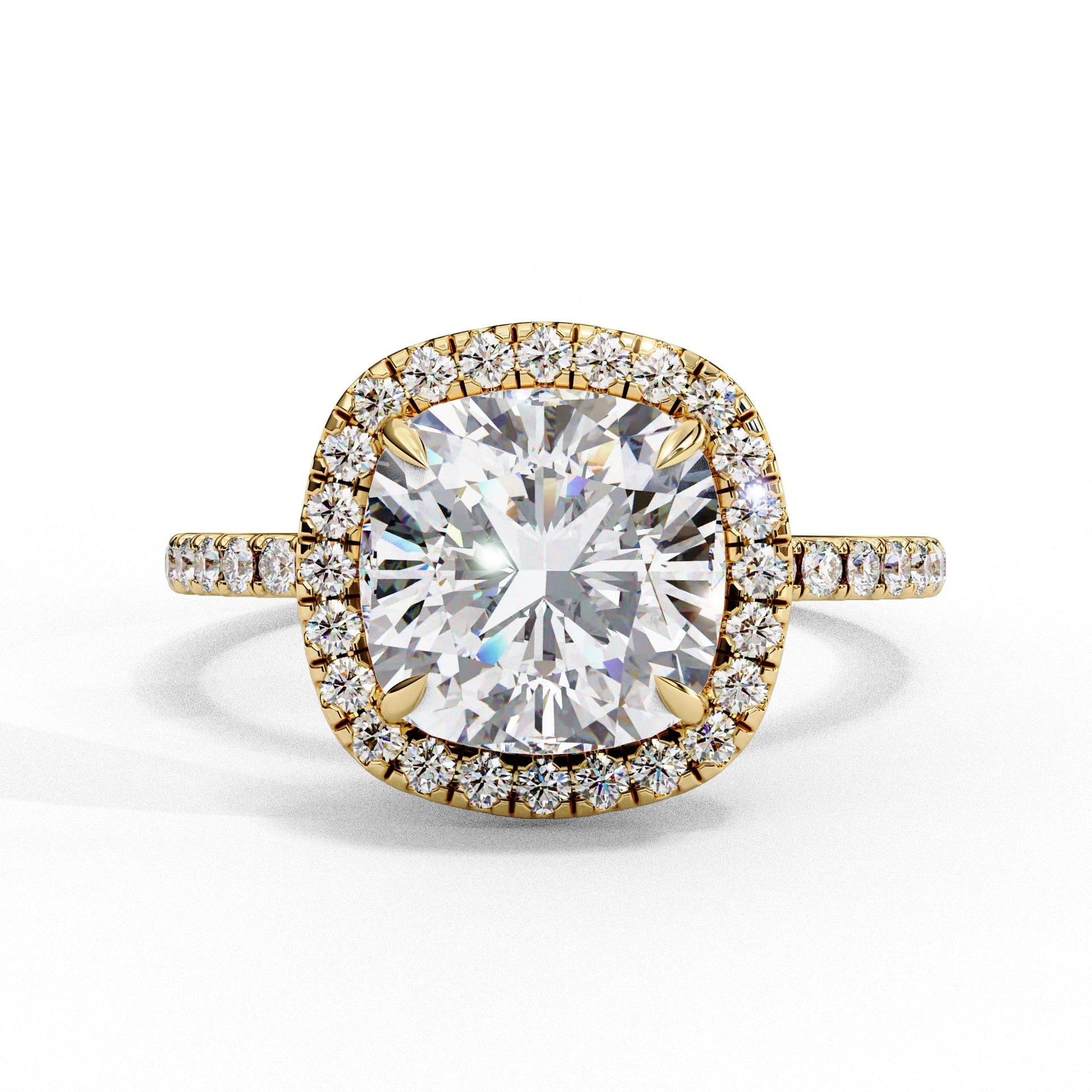 Gold ring with a large diamond and smaller diamonds around on a white background