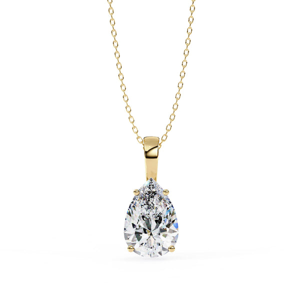 Gold necklace with a teardrop-shaped diamond pendant on a white background