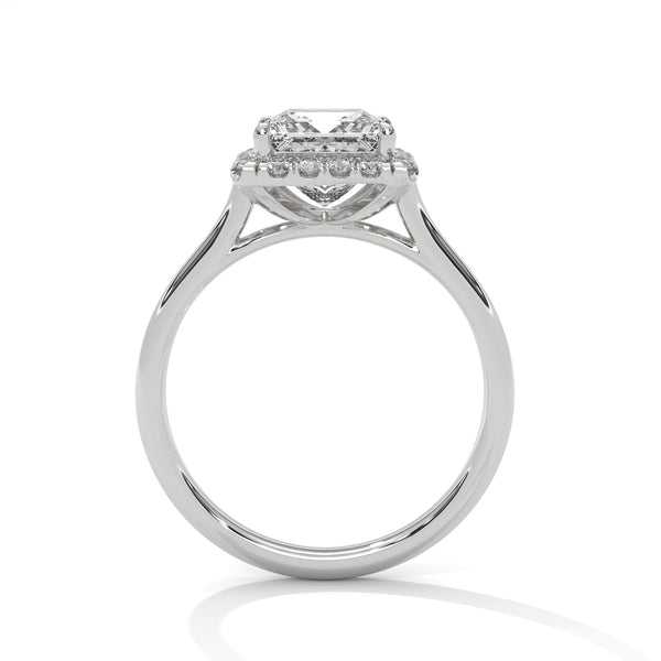 Diamond ring with a heart-shaped center stone on a white background