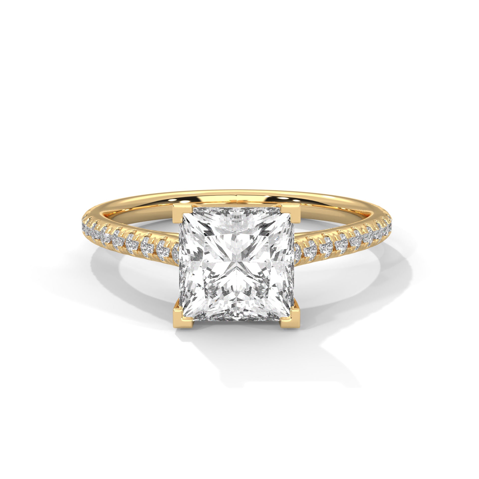 Gold ring with a large diamond and smaller diamonds on the band against a white background