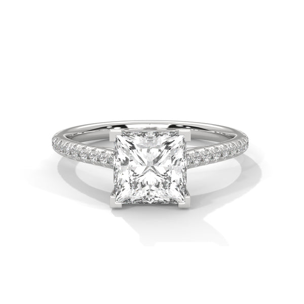 Diamond ring with a square-cut gemstone on a white background