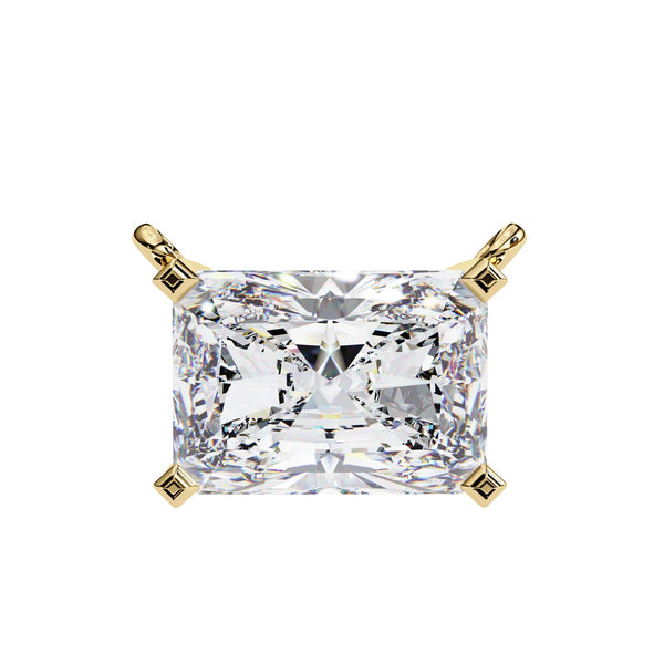 Gold pendant with a large rectangular diamond on a white background