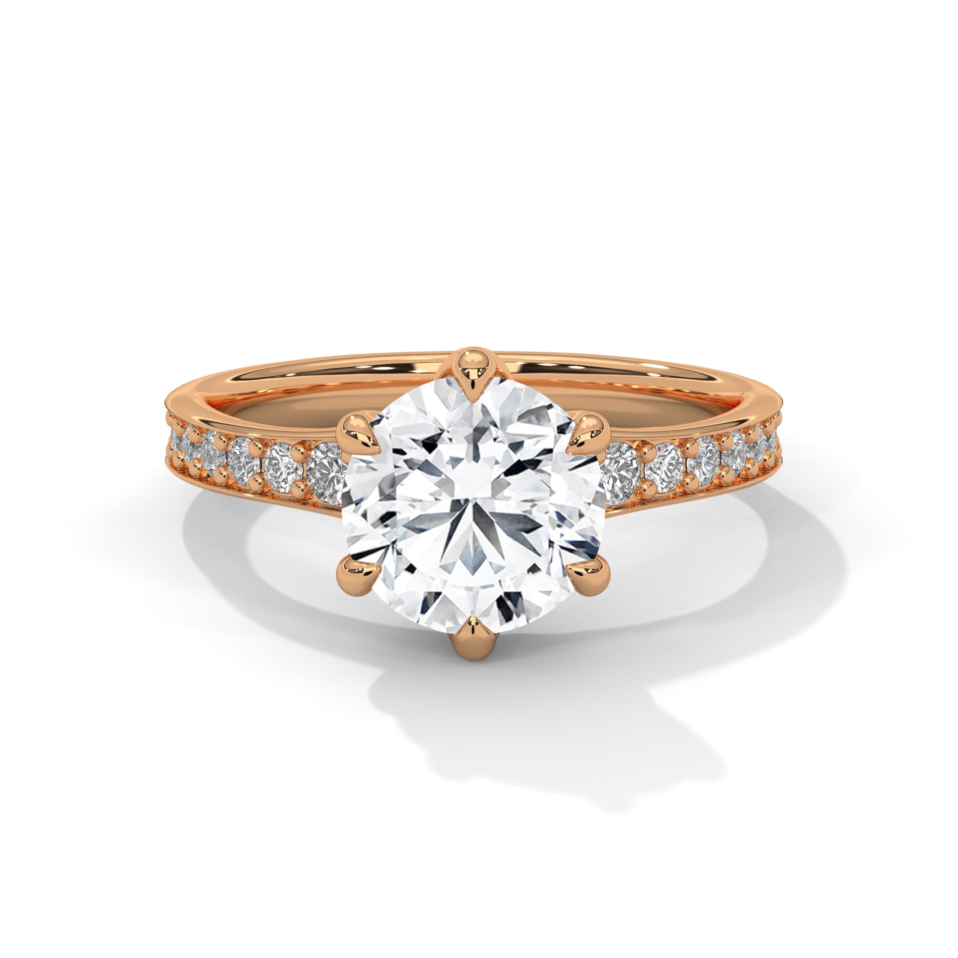 Rose gold ring with a large diamond and smaller diamonds on the band against a white background