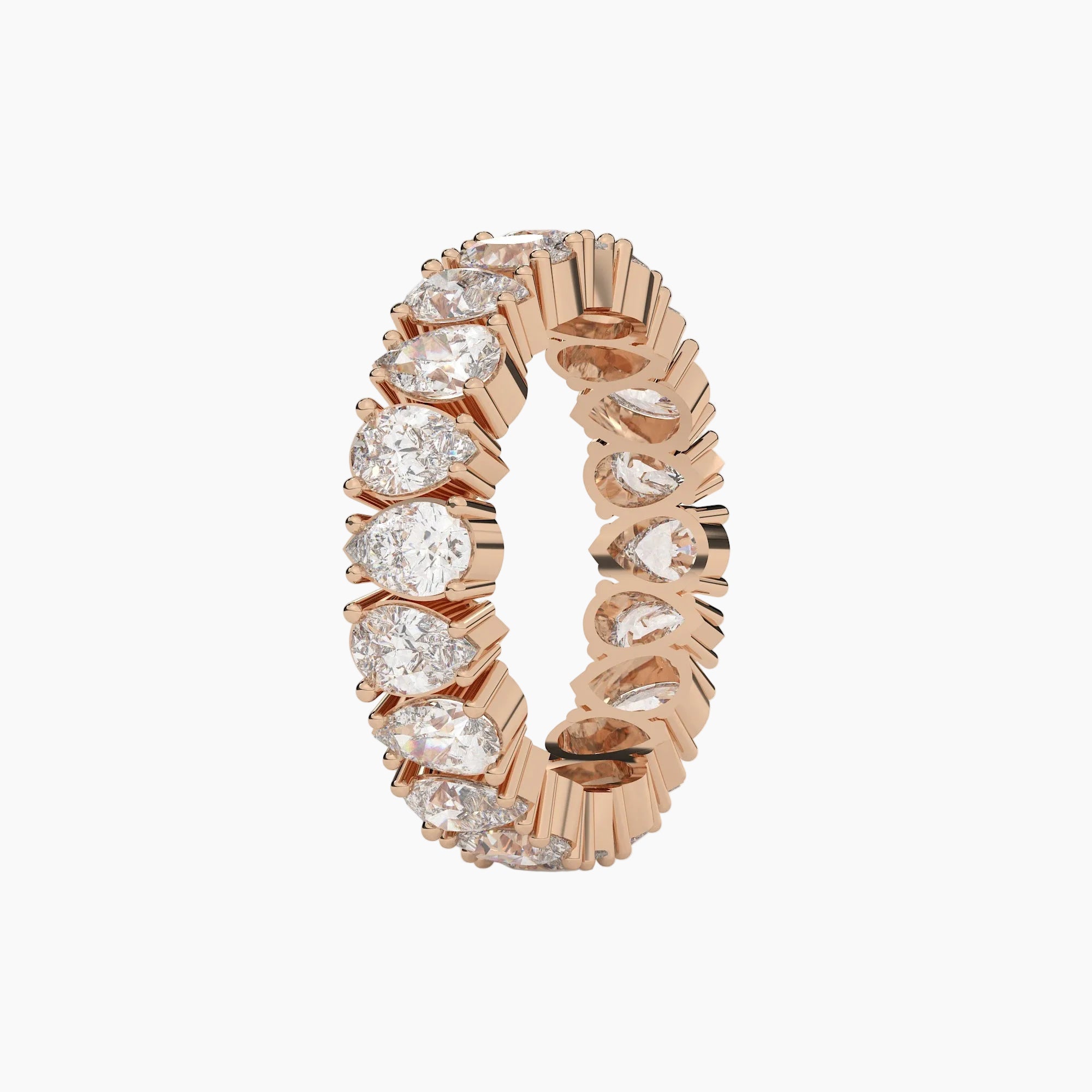 Rose gold ring with diamonds on a white background