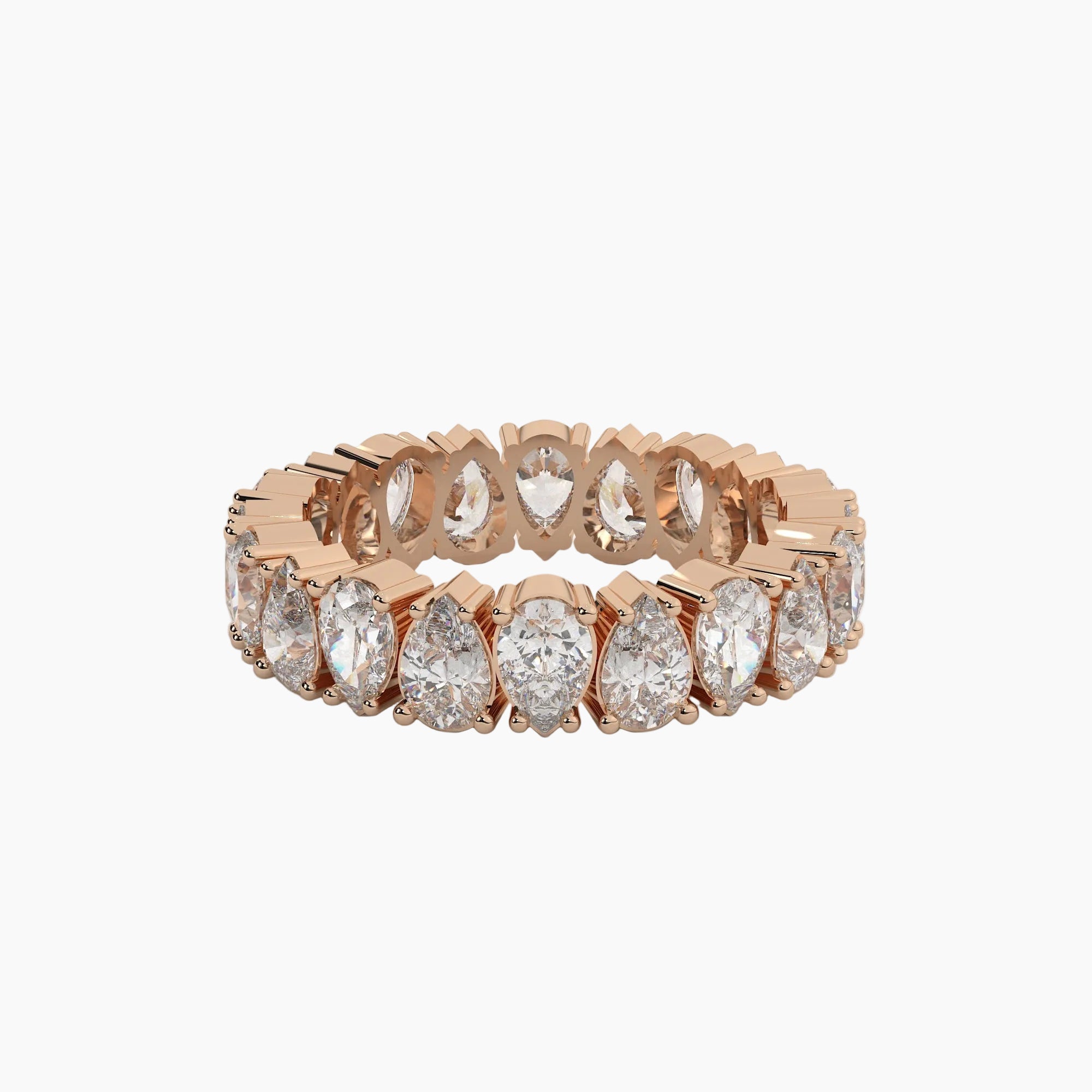 Rose gold ring with pear-shaped diamonds on a white background