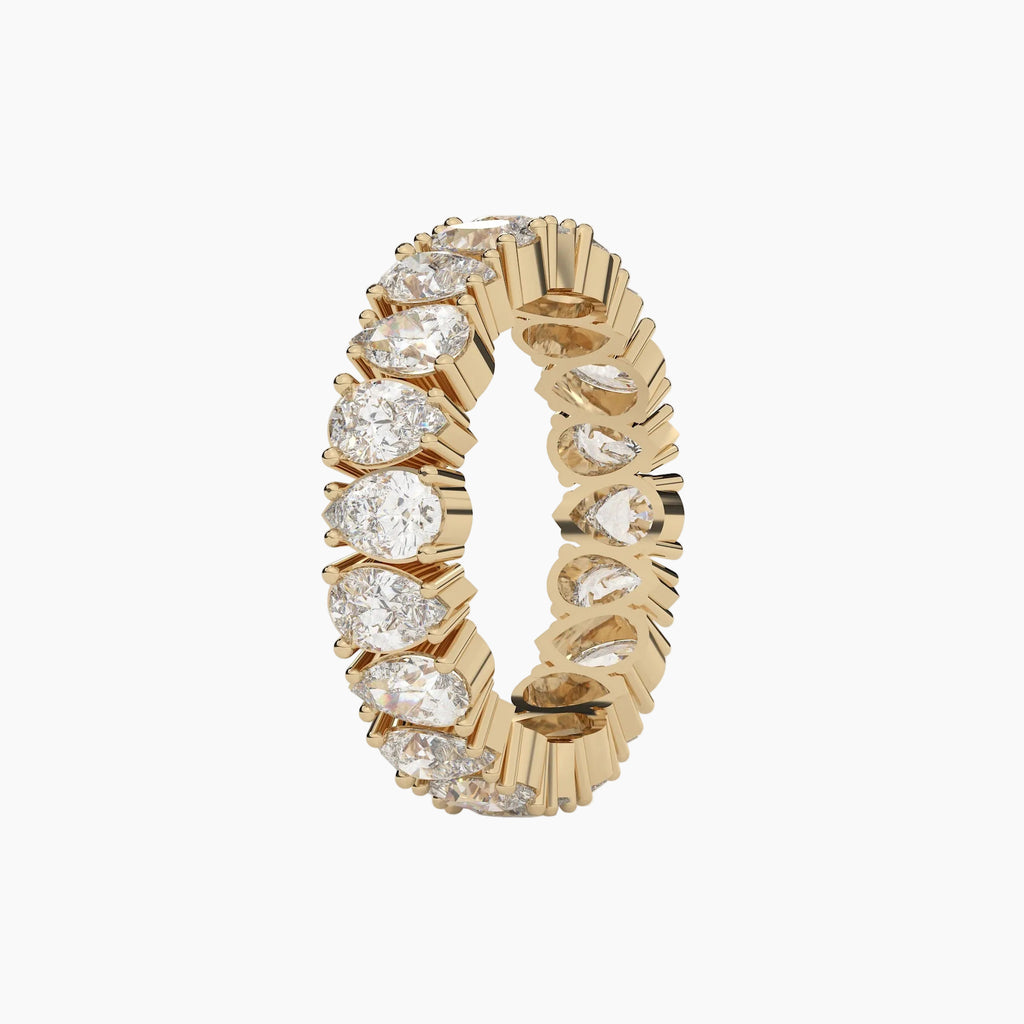 Gold ring with diamonds on a white background